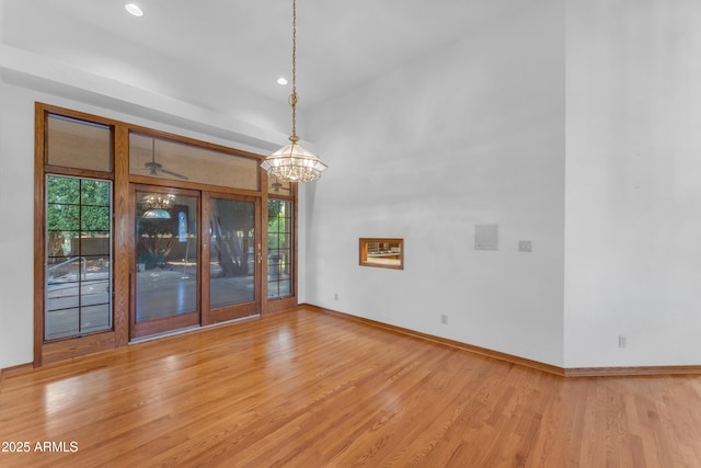8604 S Oak St, Tempe, AZ 85284 - spare room with light wood finished floors, a chandelier, and recessed lighting