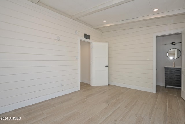 6312 N 13th St, Phoenix, AZ 85014 - empty room with light wood-style flooring, beam ceiling, baseboards, and recessed lighting