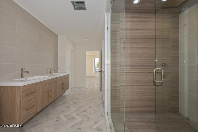 6312 N 13th St, Phoenix, AZ 85014 - full bathroom with a shower stall, recessed lighting, and double vanity