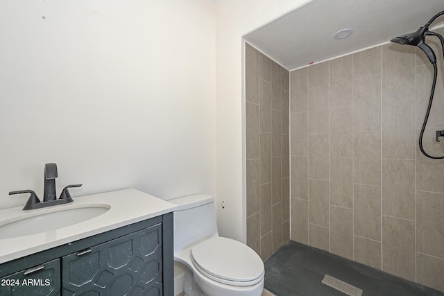 6312 N 13th St, Phoenix, AZ 85014 - full bathroom featuring a tile shower, toilet, and vanity