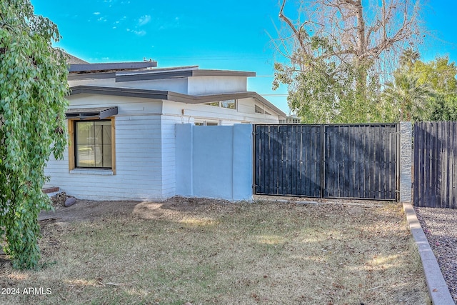 6312 N 13th St, Phoenix, AZ 85014 - view of side of property featuring a gate