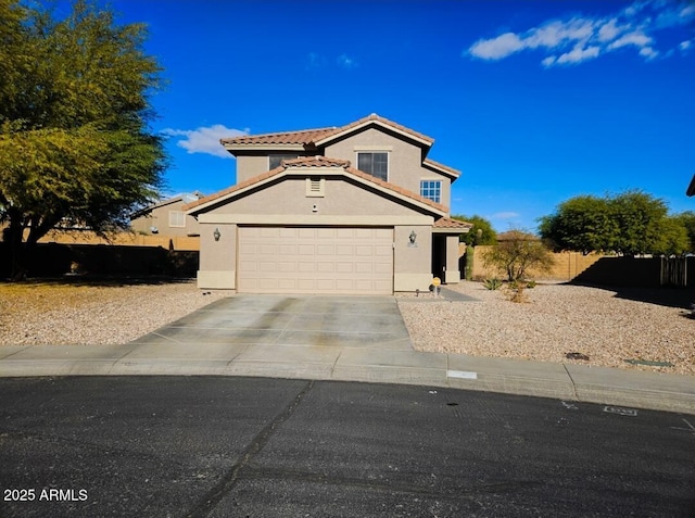 view of front of home with a garage