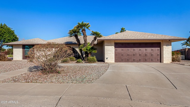 ranch-style home with a garage