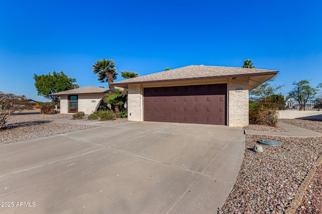 single story home with a garage