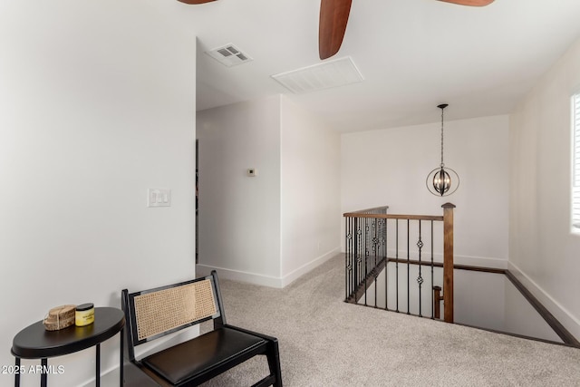 3038 E Avalon Dr, Phoenix, AZ 85016 - hallway featuring an upstairs landing, carpet, and baseboards