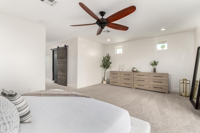 3038 E Avalon Dr, Phoenix, AZ 85016 - bedroom featuring a barn door, carpet, recessed lighting, ceiling fan, and baseboards