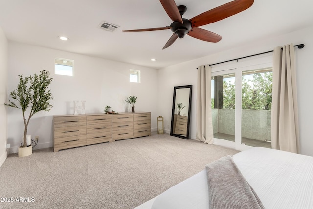 3038 E Avalon Dr, Phoenix, AZ 85016 - bedroom featuring access to outside, multiple windows, recessed lighting, and light colored carpet