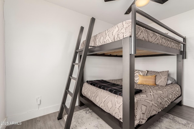 3038 E Avalon Dr, Phoenix, AZ 85016 - bedroom featuring wood finished floors, baseboards, and a ceiling fan