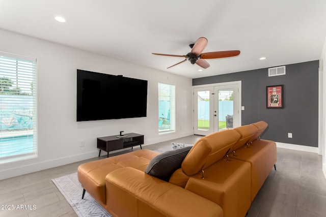 3038 E Avalon Dr, Phoenix, AZ 85016 - living area featuring a ceiling fan, recessed lighting, healthy amount of natural light, and baseboards