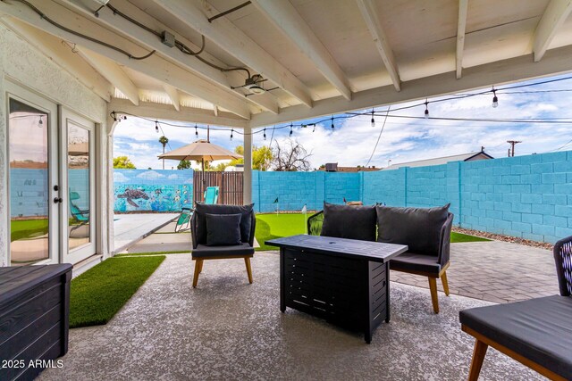 3038 E Avalon Dr, Phoenix, AZ 85016 - fenced backyard with a patio and outdoor lounge area