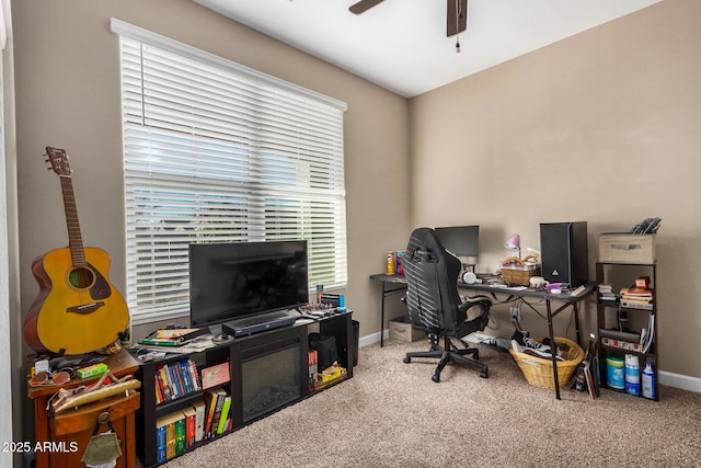 carpeted office with ceiling fan