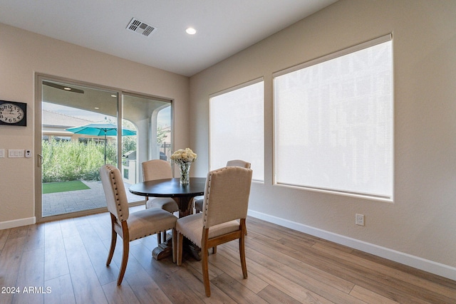 dining room with light wood-type flooring