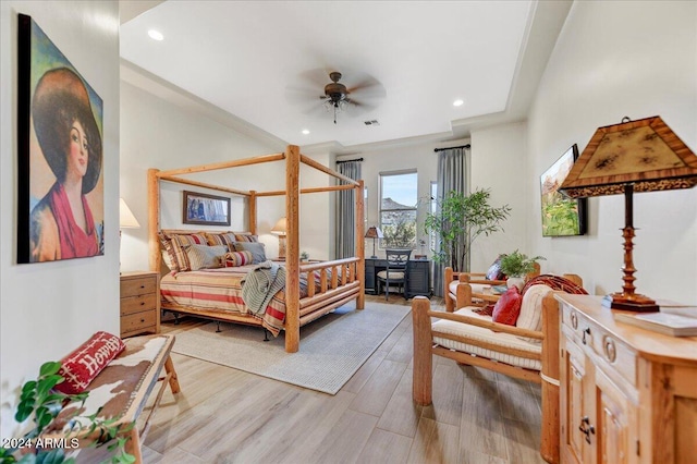 bedroom featuring light wood-type flooring and ceiling fan