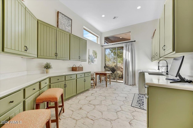 kitchen featuring green cabinets