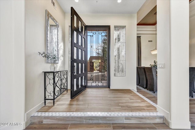 foyer entrance featuring hardwood / wood-style flooring