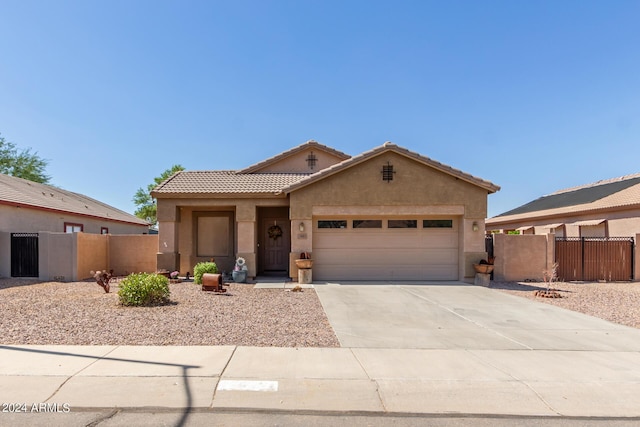 view of front of home with a garage