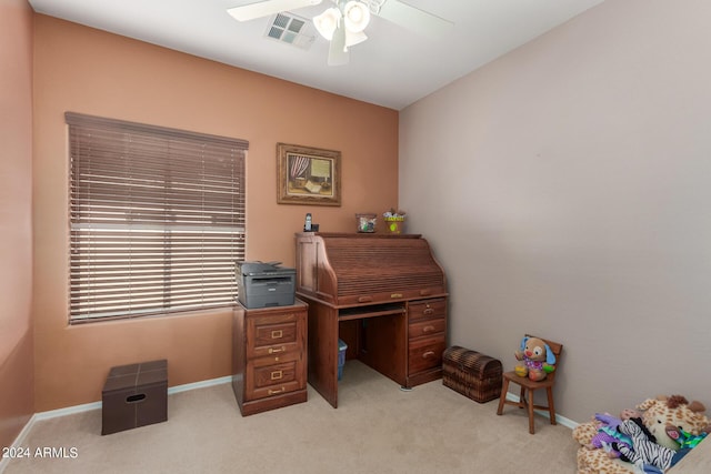 office with light carpet and ceiling fan