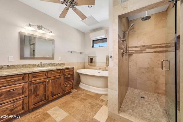 bathroom with separate shower and tub, a wall mounted AC, ceiling fan, and vanity