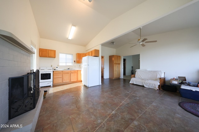 kitchen featuring ceiling fan, sink, high vaulted ceiling, white appliances, and light brown cabinetry