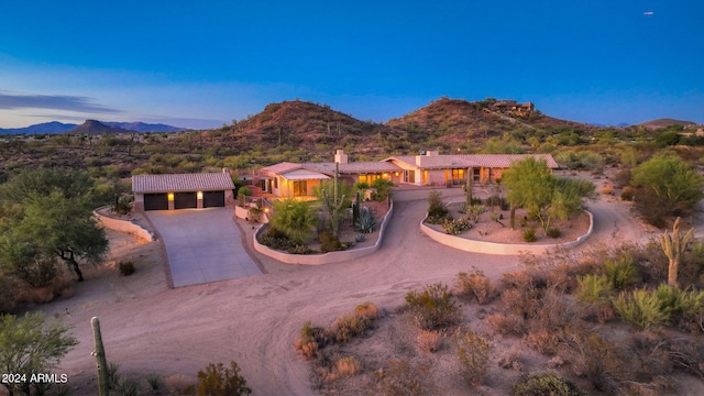 view of front of home with a mountain view