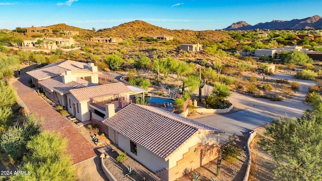 drone / aerial view featuring a mountain view