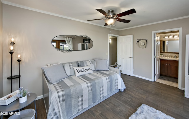 bedroom featuring crown molding, dark hardwood / wood-style flooring, ceiling fan, and ensuite bath