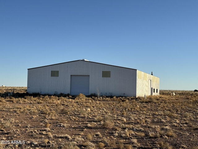 view of outbuilding with a garage