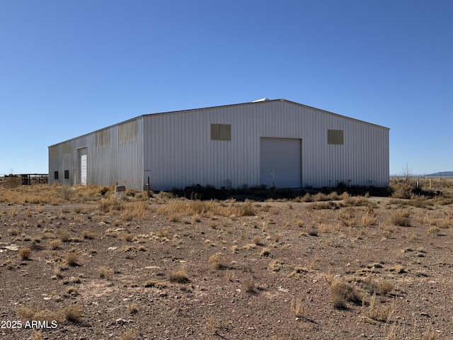 view of outdoor structure with a garage