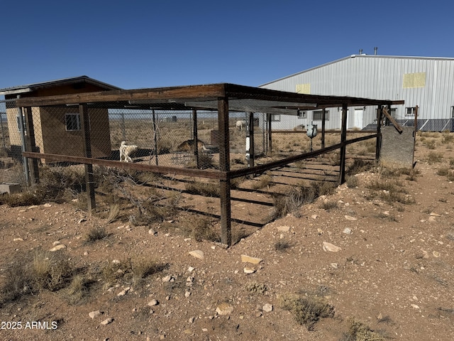 view of yard with an outdoor structure