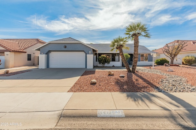 ranch-style home with a garage