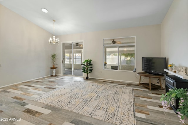 living room featuring an inviting chandelier and light wood-type flooring