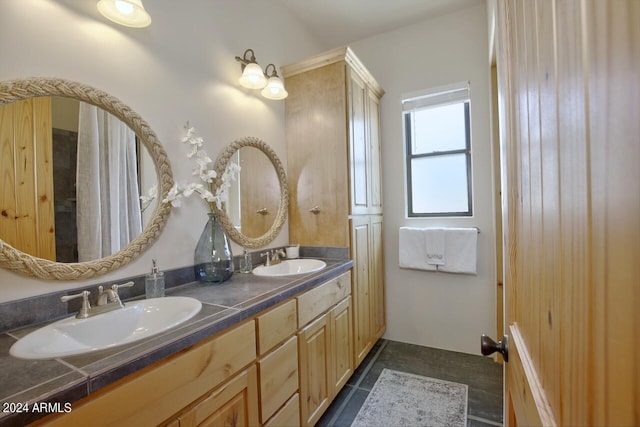 bathroom with vanity and tile patterned floors