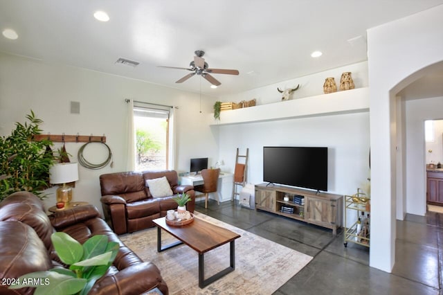 living room featuring ceiling fan