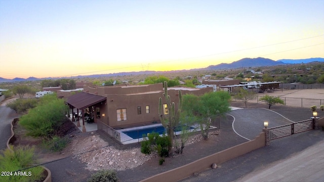 aerial view at dusk with a mountain view