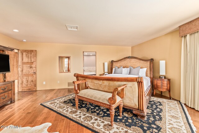 bedroom with light wood-type flooring