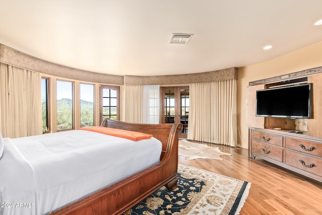 bedroom featuring light wood-type flooring