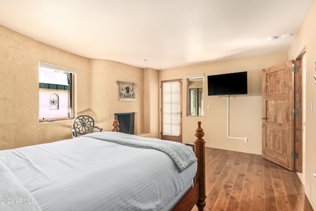 bedroom featuring dark hardwood / wood-style floors