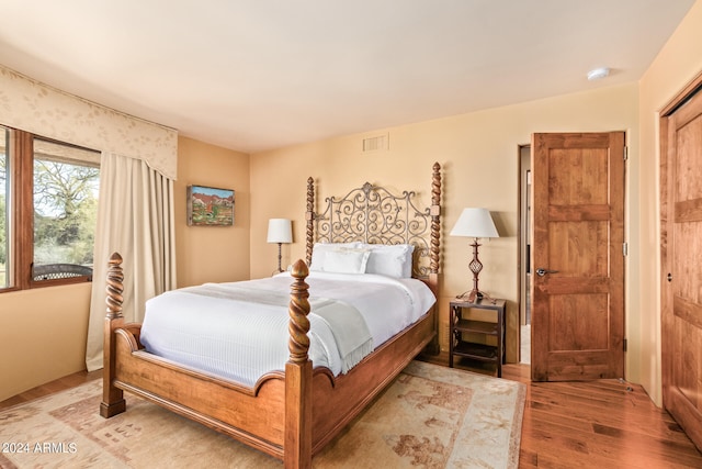 bedroom featuring light wood-type flooring