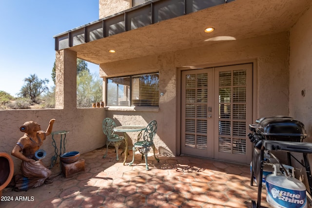 view of terrace featuring french doors