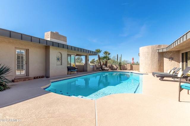 view of pool with a patio area