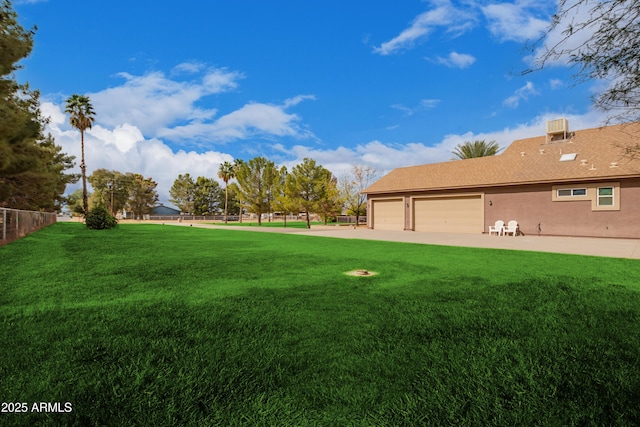 view of yard with a garage