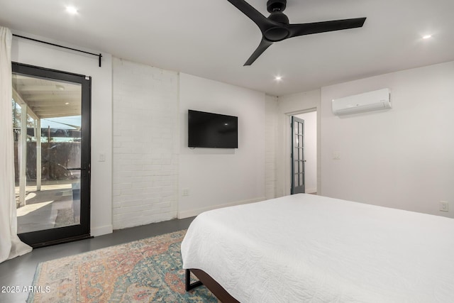 bedroom featuring a wall unit AC and ceiling fan