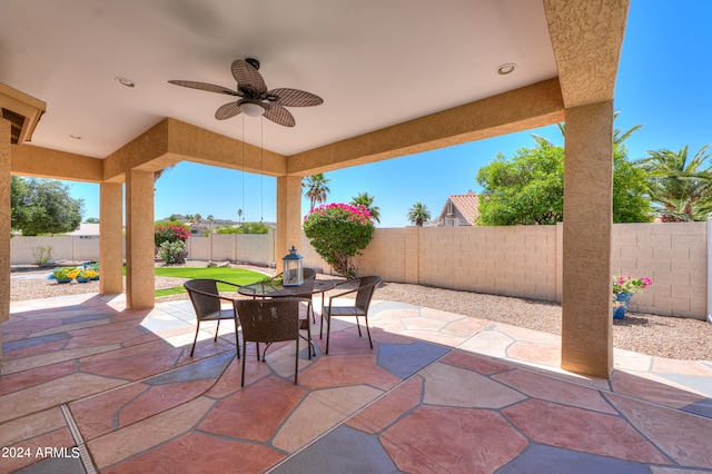 view of patio / terrace featuring ceiling fan