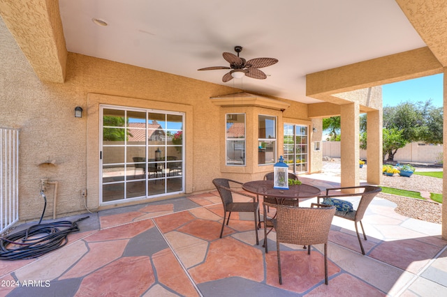 view of patio featuring ceiling fan