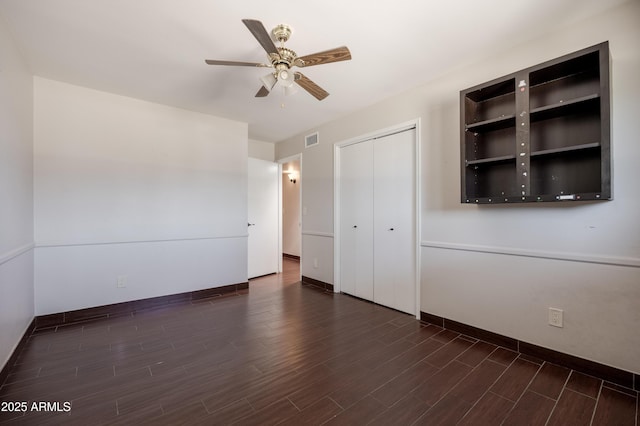 1551 E Glencove St, Mesa, AZ 85203 - unfurnished bedroom with dark wood finished floors, a closet, and ceiling fan