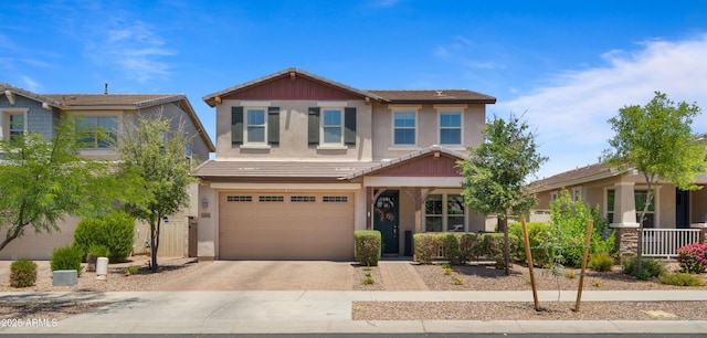 10224 E Talameer Ave, Mesa, AZ 85212 - craftsman inspired home featuring driveway, stucco siding, a garage, and a tile roof