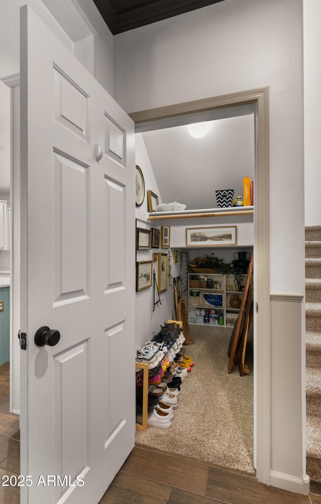10224 E Talameer Ave, Mesa, AZ 85212 - hallway with wood finished floors, stairway, and lofted ceiling