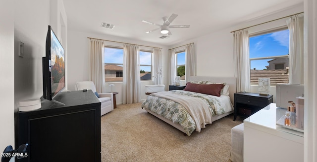 10224 E Talameer Ave, Mesa, AZ 85212 - bedroom with light colored carpet and a ceiling fan