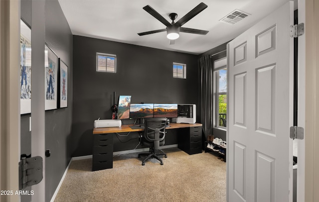10224 E Talameer Ave, Mesa, AZ 85212 - home office with light colored carpet, ceiling fan, healthy amount of natural light, and baseboards