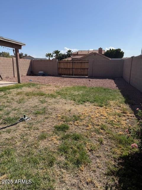 view of yard featuring a fenced backyard
